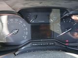 a close up of a car dashboard with a speedometer and gauges