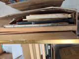 a stack of books sitting on top of a table