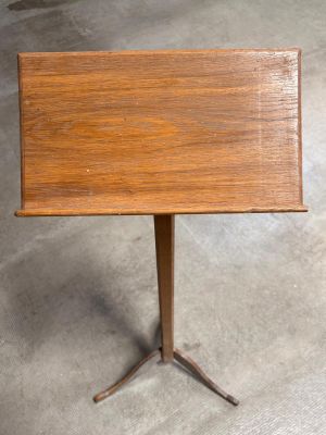 a small table with a wooden top on a metal stand
