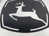a close up of a tractor logo on a white pillow