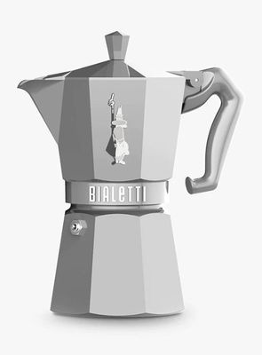 a coffee pot that is sitting on top of a table