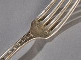 a fork that is sitting on a table