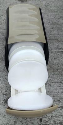 a close up of a toilet seat with the lid open