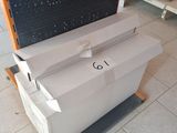 a box that is sitting on top of a carton