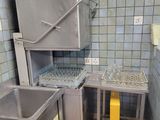 an image of a kitchen with a sink and a stove