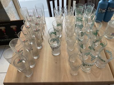 a lot of glasses on the table ready to be filled