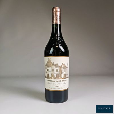 a bottle of wine that is sitting on a table