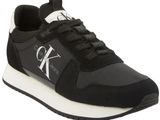 a black and white sneakers with a logo on the side