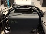 an image of a printer sitting on top of a table next to a bunch of wires