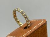 a close up of a ring sitting on top of a wooden box