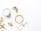 many different types of rings on a white surface