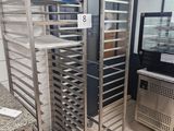a picture of a commercial kitchen with a lot of trays of food