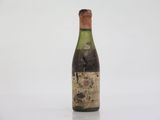 a bottle of wine that is sitting on a table