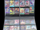 a lot of cards in a clear box on a black background