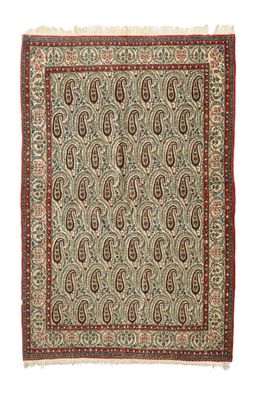 un tapis persan ancien orné d'un motif paisley
