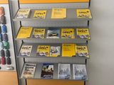 a display of magazines on a shelf in a store
