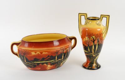 two vases sitting next to each other on a white surface