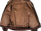 the back view of a brown jacket with a leather collar