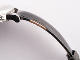 an image of a close up of a watch on a white surface