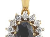 une image représentant un pendentif en forme de diamant noir et blanc sur fond blanc