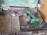 a tool box with tools in it sitting on the floor