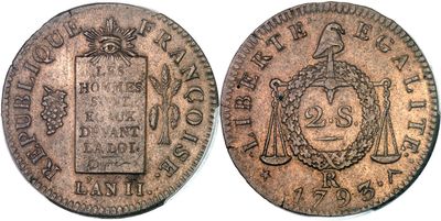 une vieille pièce de monnaie sur laquelle figure l'image d'un homme