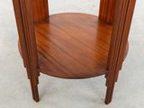 an image of a round table with a wooden top