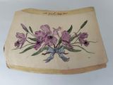 a painting of purple flowers on the side of a piece of paper