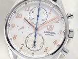 Gros plan sur une montre avec un bracelet en cuir marron
