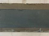 a picture of a chalk board hanging on a wall