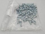 a bag of screws and nuts on a table