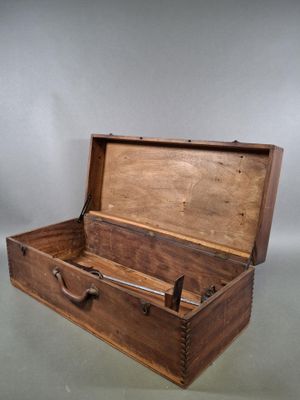 a wooden box that is open on a table