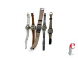 three different types of watches are displayed on a white surface