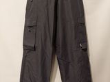an image of a pair of cargo pants hanging on a hanger