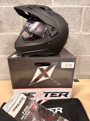 an image of a black helmet sitting on top of a box