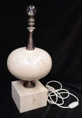 a lamp that is sitting on top of a block