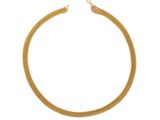 une image d'un collier en or sur fond blanc
