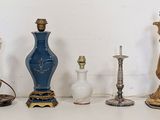 a lot of different types of lamps on the table
