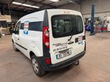 a white van that is parked in a garage