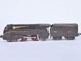 a toy train that is sitting on a white surface