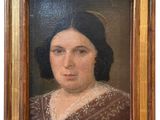 an old painting of a woman in a brown dress in a gold frame