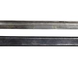 two knives that are sitting side by side on a white surface