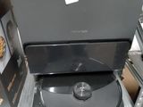 an image of a cd player sitting on a shelf in a store