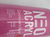 an image of a bottle of pink shampooe on a white surface