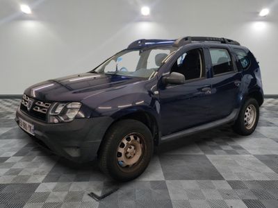 a picture of a blue car parked in a garage