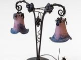 a lamp that is sitting on a table next to a mouse