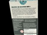 the back of a box with a label on it on a black background