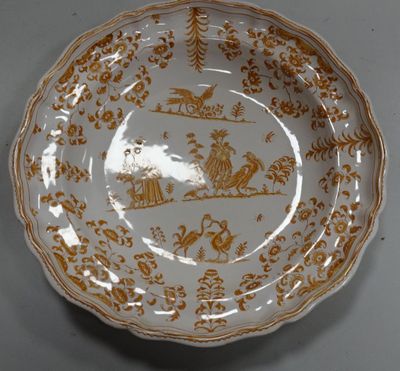 an image of a brown and white plate on a table