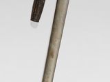 a sword that is sitting on top of a table