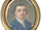 portrait d'un homme en manteau bleu dans un cadre doré